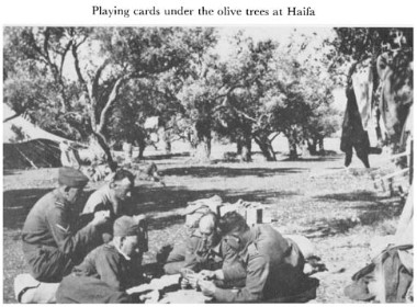 Black and white photograph of soldiers resting