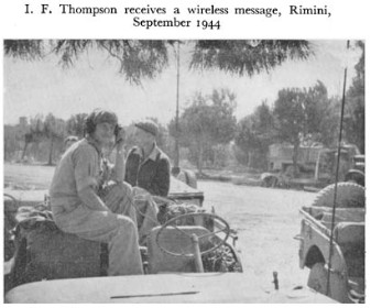 Black and white photograph of soldiers on army vehicles